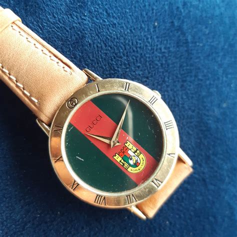 gucci 3000m watch crown pin.